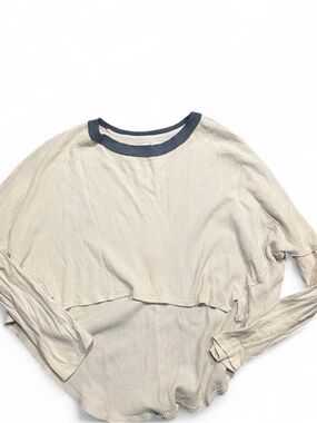 Light Beige Long Sleeve waffle Top with Navy Trim cropped front longer in back